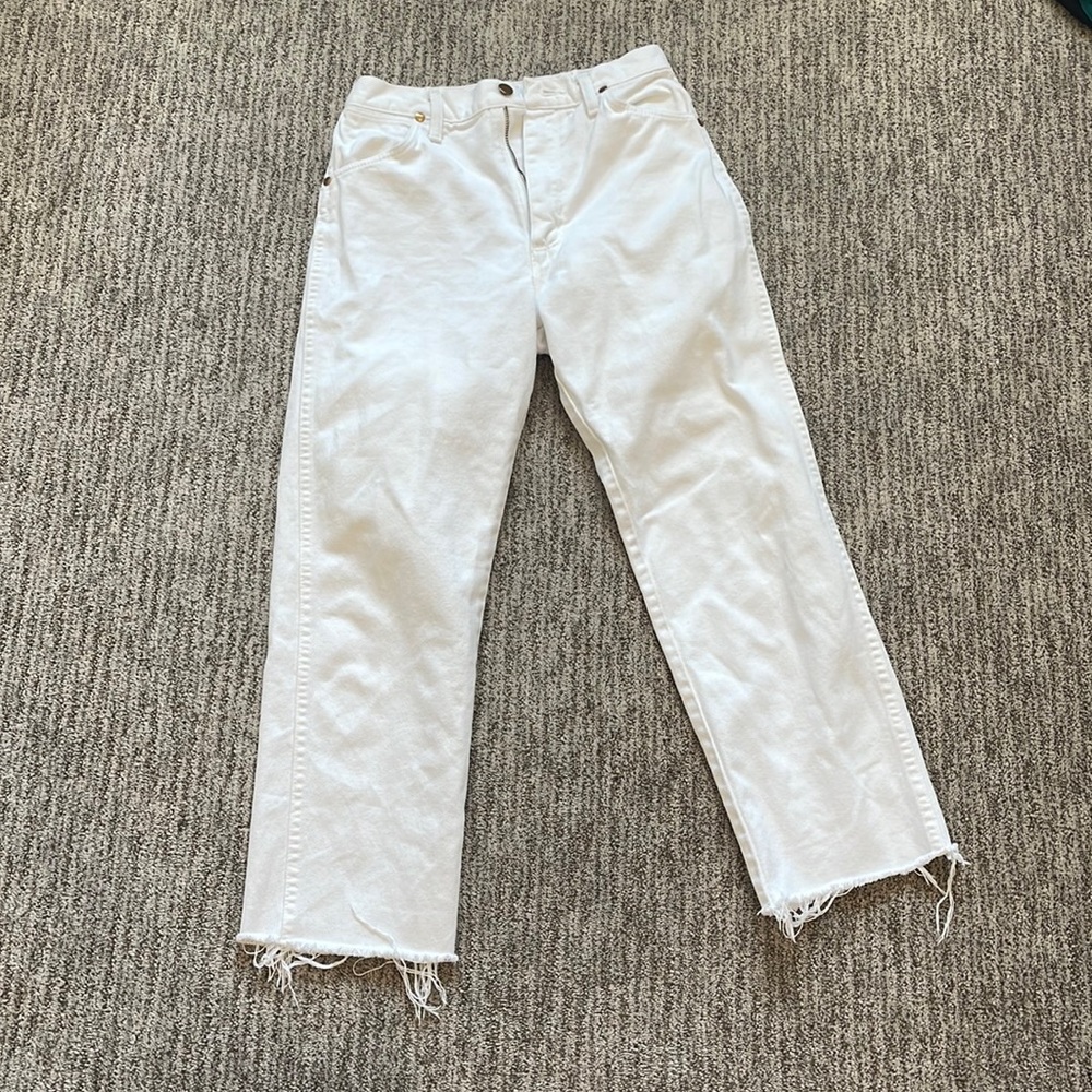 White denim wrangler jeans